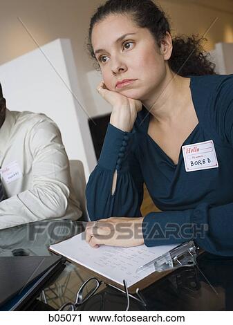 Bored businesswoman sitting View Large Photo Image Stock Image - Bored businesswoman sitting. Fotosearch