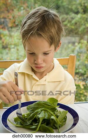Boy eating View Large Photo Image Stock Image - Boy eating. Fotosearch
