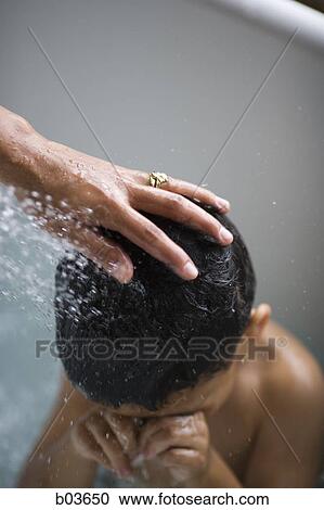 Stock Image - Boy in bathtub. Fotosearch