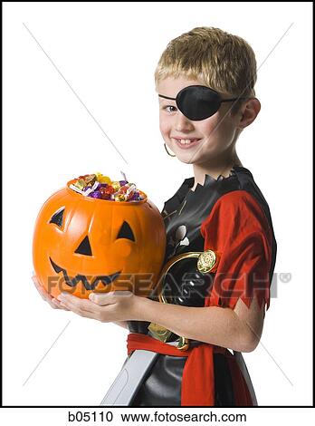 Boy in Halloween pirate costume View Large Photo Image Stock Image - Boy in Halloween pirate costume. Fotosearch