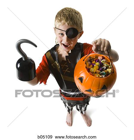 Boy in Halloween pirate costume View Large Photo Image Stock Photo - Boy in Halloween pirate costume. Fotosearch