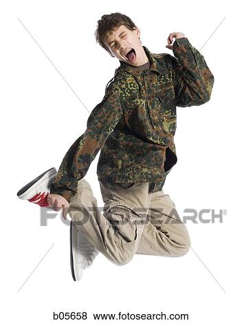 Boy jumping View Large Photo Image Stock Photo - Boy jumping. Fotosearch
