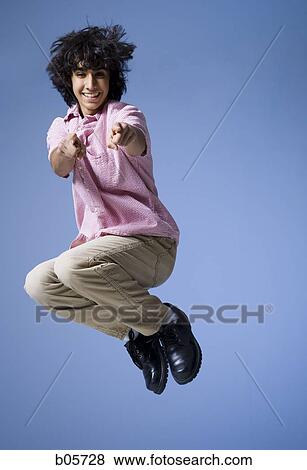 Boy jumping View Large Photo Image Stock Photo - Boy jumping. Fotosearch