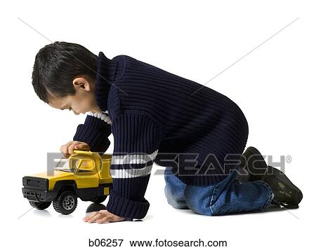 Stock Photo - Boy playing. Fotosearch