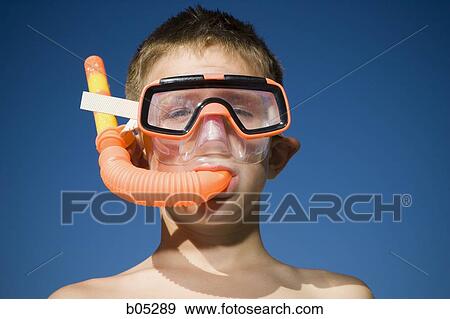 Boy with snorkel and mask with blue sky View Large Photo Image Stock Photo - Boy with snorkel and mask with blue sky. Fotosearch