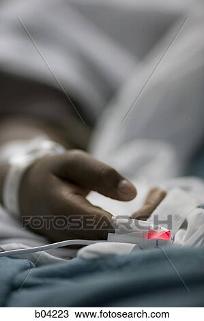 Boy's hand with pulse monitor on finger View Large Photo Image Stock Image - Boy's hand with pulse monitor on finger. Fotosearch
