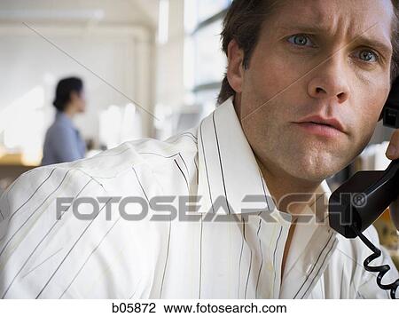 Businessman on the phone View Large Photo Image Stock Image - Businessman on the phone. Fotosearch