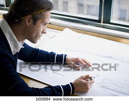 Businessman working View Large Photo Image Picture - Businessman working. Fotosearch