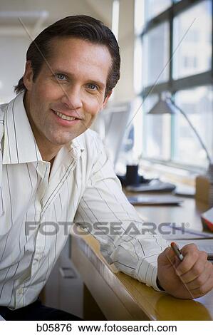 Businessman working View Large Photo Image Stock Photograph - Businessman working. Fotosearch