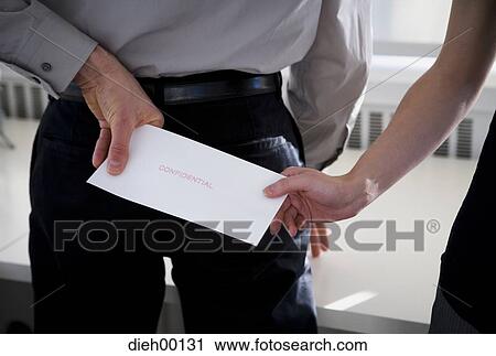 Businesspeople passing confidential information View Large Photo Image Stock Image - Businesspeople passing confidential information. Fotosearch