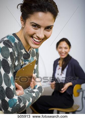 Businesspeople working View Large Photo Image Stock Image - Businesspeople working. Fotosearch