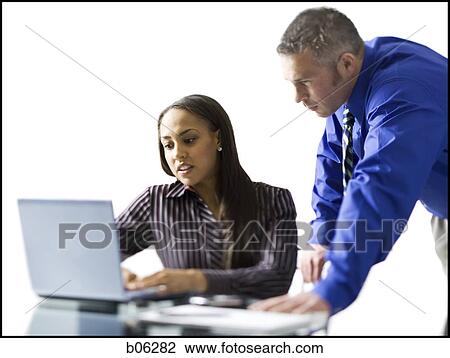 Businesspeople working View Large Photo Image Stock Image - Businesspeople working. Fotosearch