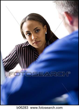 Businesspeople working View Large Photo Image Stock Image - Businesspeople working. Fotosearch