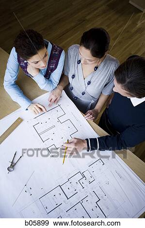 Businesspeople working View Large Photo Image Stock Photo - Businesspeople working. Fotosearch