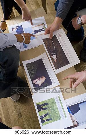 Stock Photograph - Businesspeople working. Fotosearch