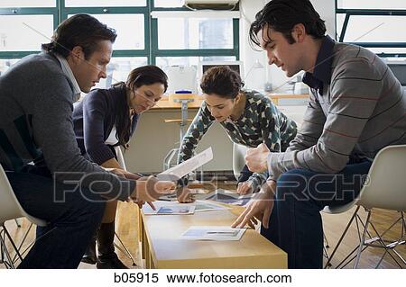 Businesspeople working View Large Photo Image Stock Photography - Businesspeople working. Fotosearch