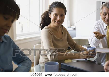 Businesswoman at meeting View Large Photo Image Stock Image - Businesswoman at meeting. Fotosearch