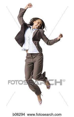 Picture - Businesswoman jumping. Fotosearch