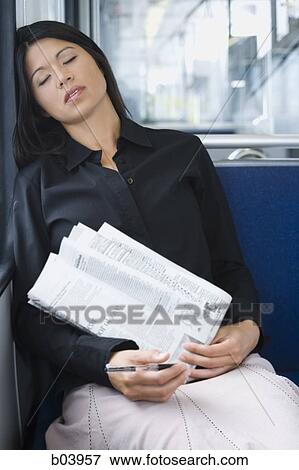 Businesswoman on city bus or subway sleeping View Large Photo Image Stock Photo - Businesswoman on city bus or subway sleeping. Fotosearch