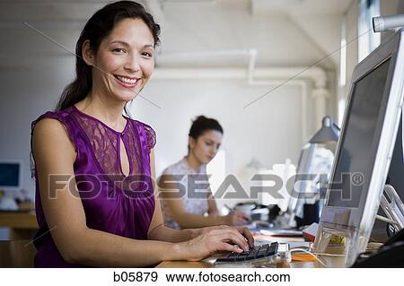 Businesswoman working View Large Photo Image Stock Photo - Businesswoman working. Fotosearch