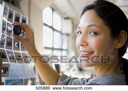Businesswoman working View Large Photo Image Stock Photo - Businesswoman working. Fotosearch