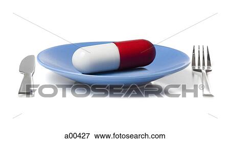 Capsule on a plate View Large Photo Image Stock Photo - Capsule on a plate. Fotosearch