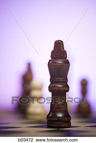 Chess board and chess pieces View Large Photo Image Stock Image - Chess board and chess pieces. Fotosearch