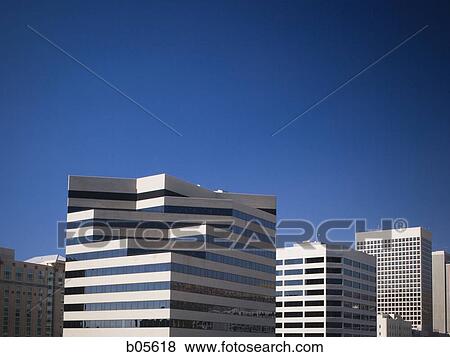 City Skyline with skyscrapers and blue sky View Large Photo Image Stock Photo - City Skyline with skyscrapers and blue sky. Fotosearch
