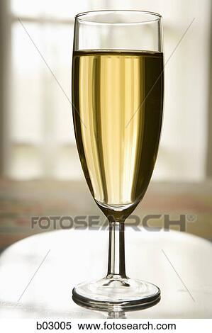 Stock Photography - Close up of a glass of white wine. Fotosearch