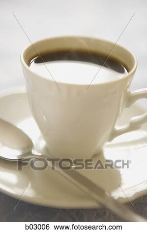 Close up of coffee in cup View Large Photo Image Stock Photograph - Close up of coffee in cup. Fotosearch