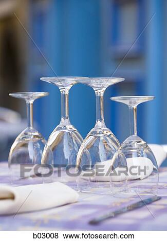 Stock Photo - Close up of empty wine glasses. Fotosearch