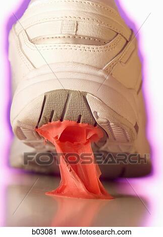Close up of gum stuck to running shoe View Large Photo Image Stock Image - Close up of gum stuck to running shoe. Fotosearch