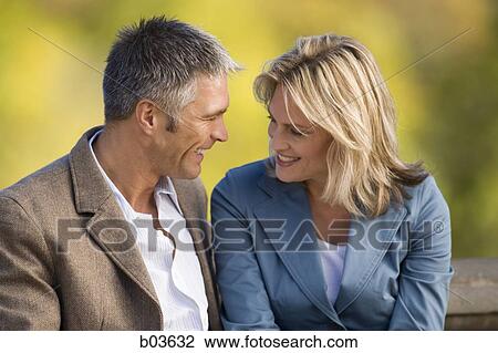 Close up of man and woman smiling View Large Photo Image Stock Image - Close up of man and woman smiling. Fotosearch