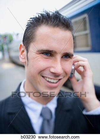 Close up of man on cell phone View Large Photo Image Stock Image - Close up of man on cell phone. Fotosearch