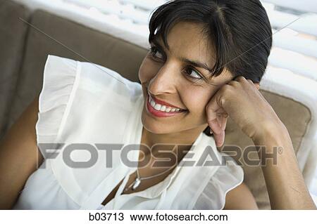 Close up of woman on sofa View Large Photo Image Stock Image - Close up of woman on sofa. Fotosearch