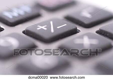 Stock Image - Closeup of +/1 on calculator. Fotosearch