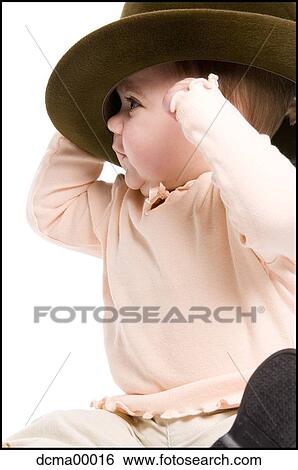 Closeup of a baby with a hat View Large Photo Image Stock Photograph - Closeup of a baby with a hat. Fotosearch