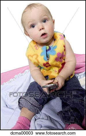 Closeup of a baby with cell phone View Large Photo Image Stock Image - Closeup of a baby with cell phone. Fotosearch