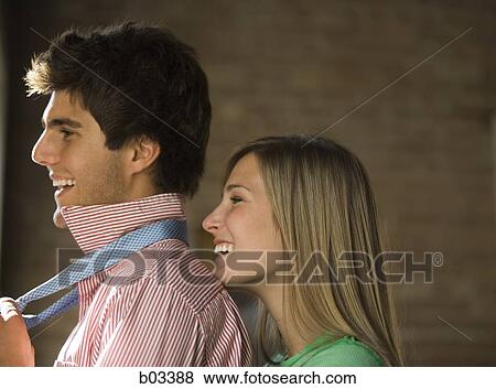 Closeup of a couple smiling View Large Photo Image Stock Photo - Closeup of a couple smiling. Fotosearch