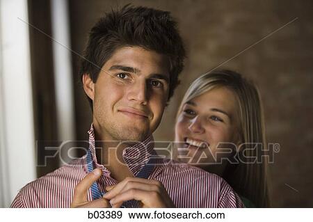 Closeup of a couple smiling View Large Photo Image Stock Photo - Closeup of a couple smiling. Fotosearch