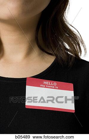 Closeup of blank name tag on female View Large Photo Image Stock Photo - Closeup of blank name tag on female. Fotosearch