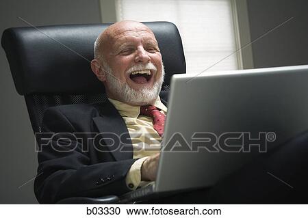 Closeup of businessman laughing View Large Photo Image Stock Image - Closeup of businessman laughing. Fotosearch