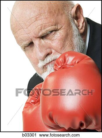 Closeup of businessman with boxing gloves View Large Photo Image Stock Image - Closeup of businessman with boxing gloves. Fotosearch