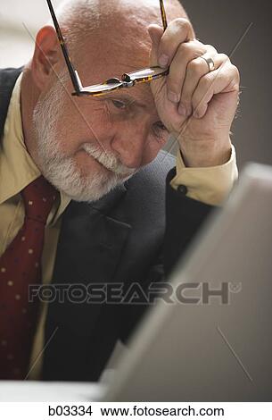Closeup of businessman with eyeglasses View Large Photo Image Picture - Closeup of businessman with eyeglasses. Fotosearch