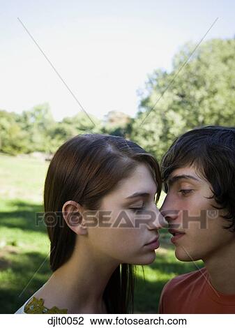 Closeup of couple kissing View Large Photo Image Stock Image - Closeup of couple kissing. Fotosearch