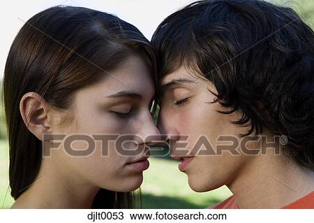 Closeup of couple kissing View Large Photo Image Stock Image - Closeup of couple kissing. Fotosearch
