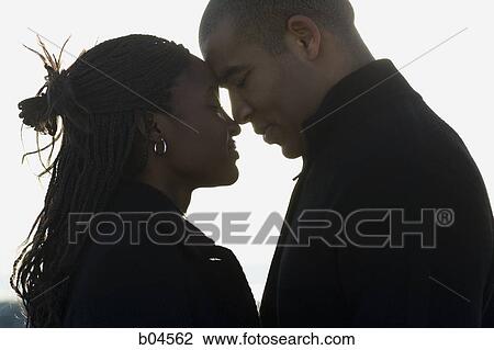 Stock Image - Closeup of couple smiling. Fotosearch