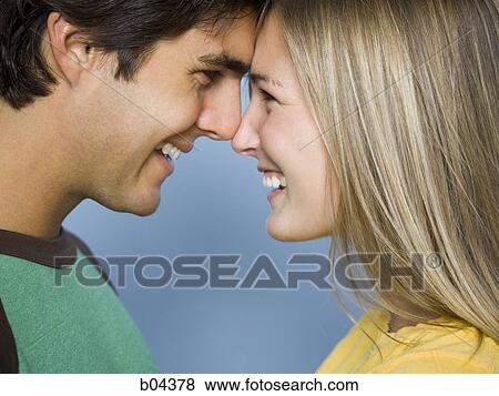 Closeup of couple smiling View Large Photo Image Stock Photo - Closeup of couple smiling. Fotosearch