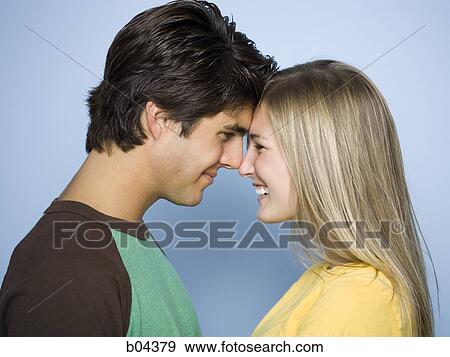 Closeup of couple smiling View Large Photo Image Stock Photo - Closeup of couple smiling. Fotosearch