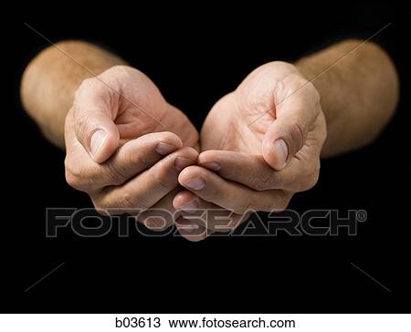 Stock Image - Closeup of cupped hands. Fotosearch